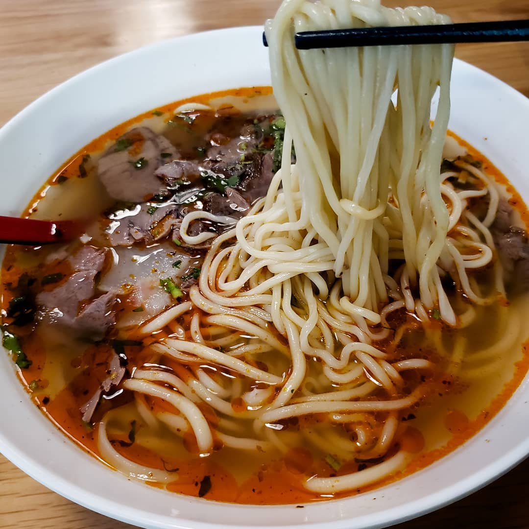 Handcrafted noodles in soup at Nouille Lan Zhou restaurant in Montreal.